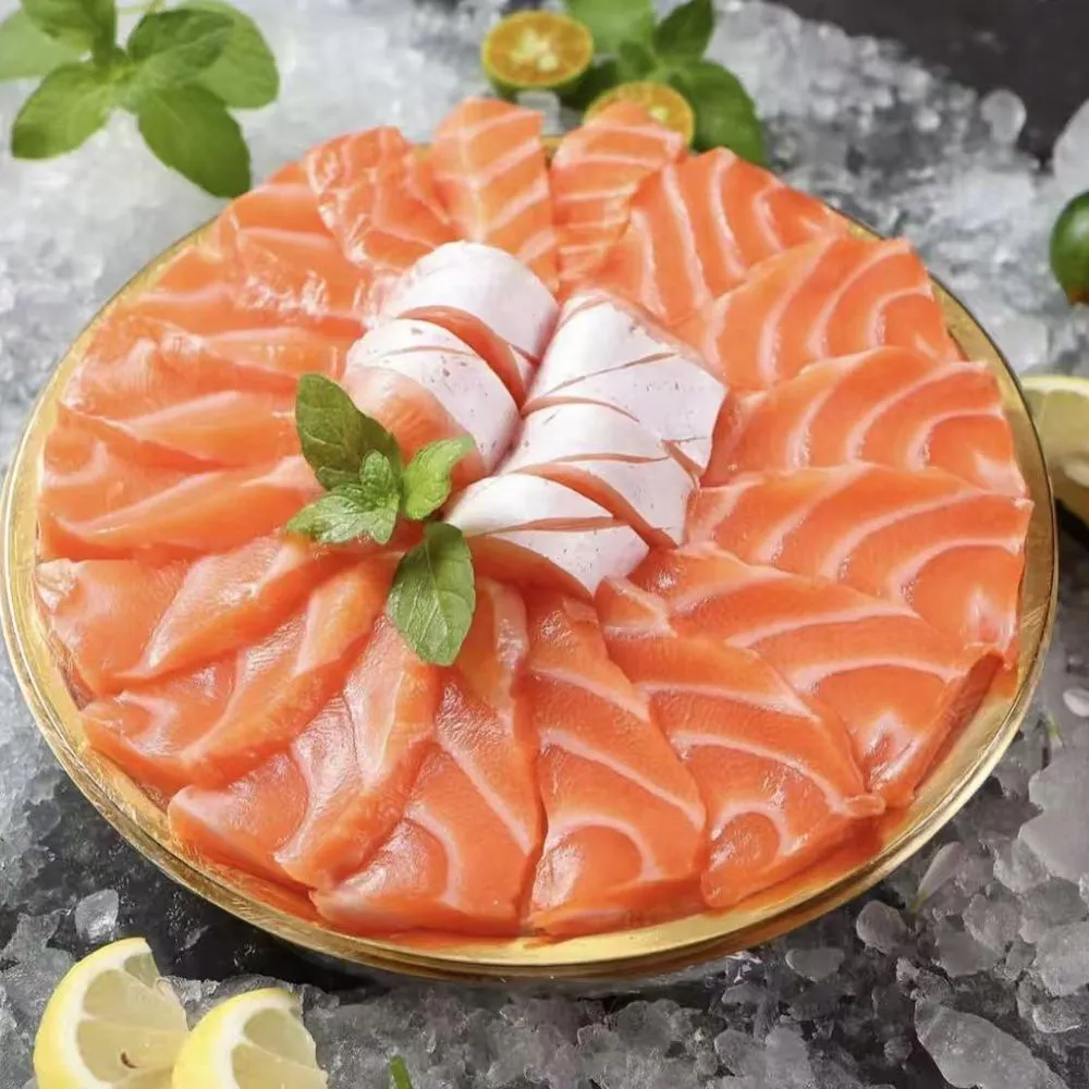 Fresh salmon sashimi platter on ice with lemon wedges at Nami Sushi Ramen, a Japanese Restaurant in Los Angeles